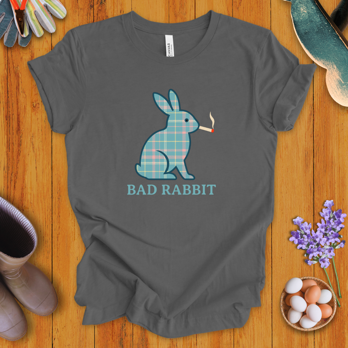Funny plaid rabbit t-shirt with bunny smoking a cigarette, text says “Bad Rabbit”