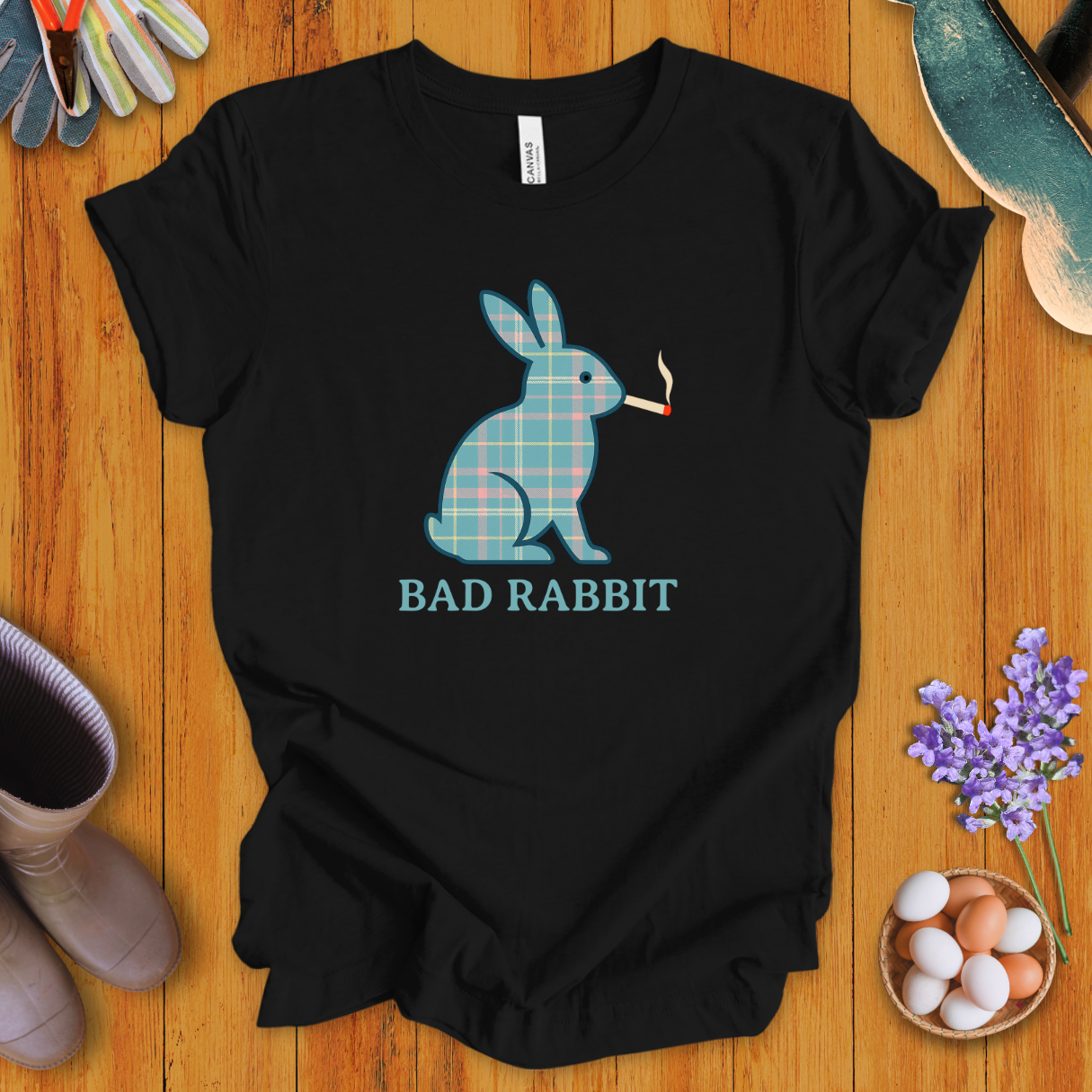 Funny plaid rabbit t-shirt with bunny smoking a cigarette, text says “Bad Rabbit”