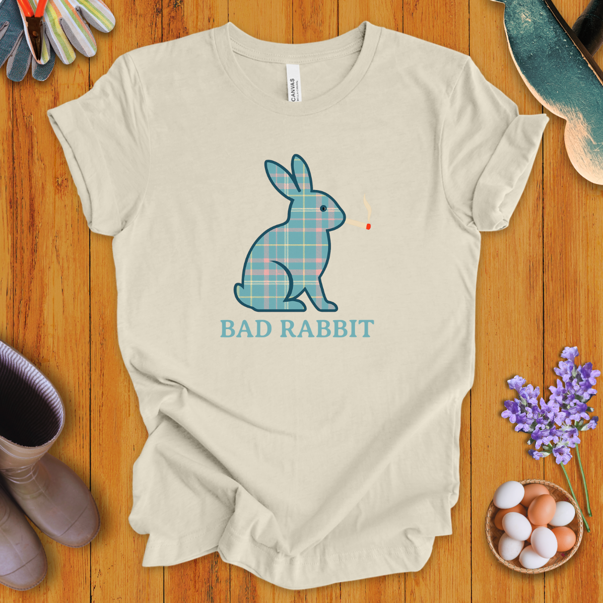Funny plaid rabbit t-shirt with bunny smoking a cigarette, text says “Bad Rabbit”