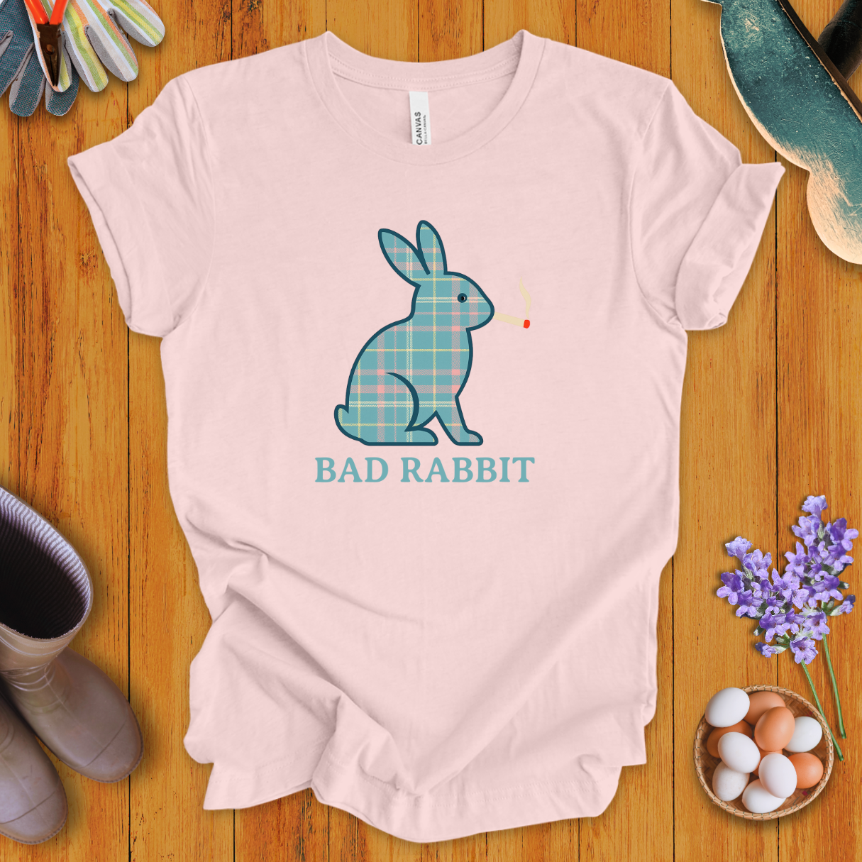 Funny plaid rabbit t-shirt with bunny smoking a cigarette, text says “Bad Rabbit”