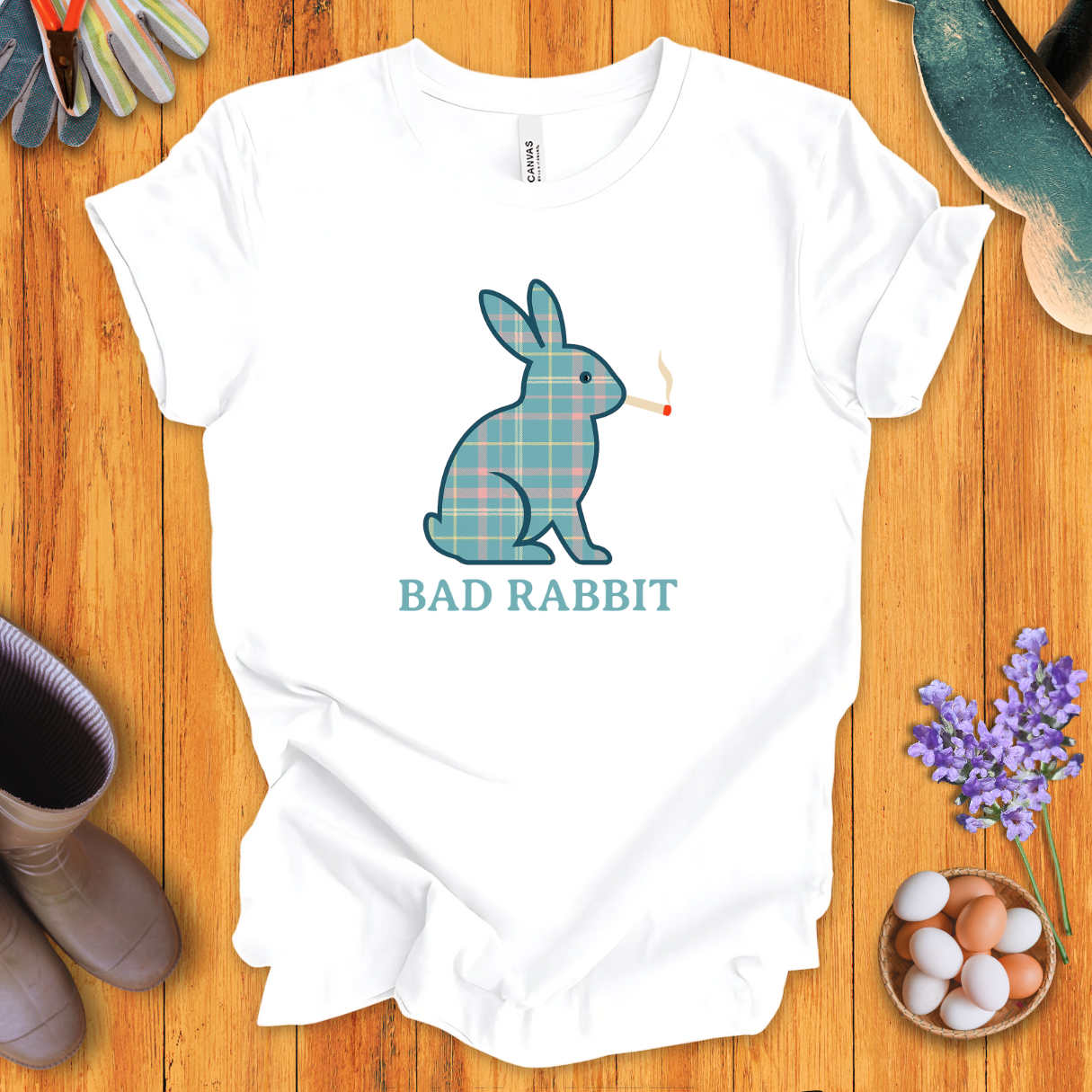 Funny plaid rabbit t-shirt with bunny smoking a cigarette, text says “Bad Rabbit”